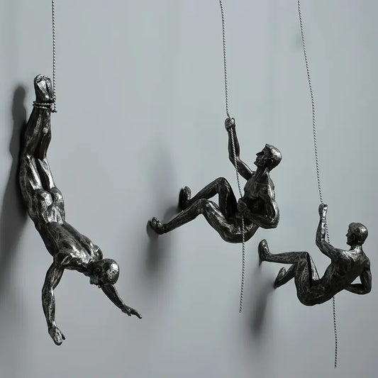 Vintage Industrial Wall Decor with Climbing Figurines